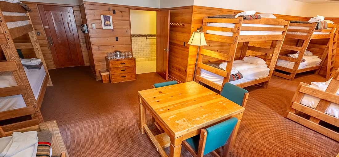 EXTRA LARGE TIMBERLINE CHALET ROOM WITH SIX BUNKS AND SEATING AREA