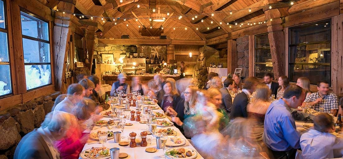 GUESTS DINING AT SILCOX HUT