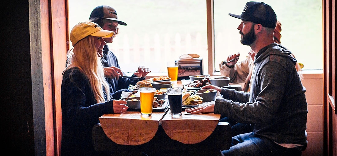 Group of 4 dining at Timberline Summit Pass