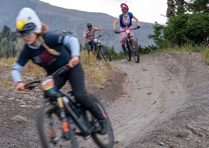 THREE MOUNTAIN BIKERS IN COSTUME RACING IN THE TIMBERLINE DAYDREAM TEAM ENDURO PRODUCED BY RACE CASCADIA