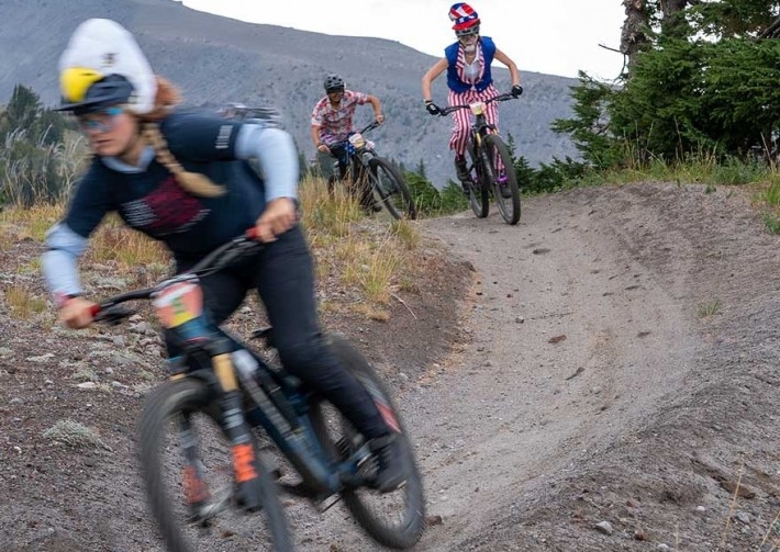 THREE MOUNTAIN BIKERS IN COSTUME RACING IN THE TIMBERLINE DAYDREAM TEAM ENDURO PRODUCED BY RACE CASCADIA
