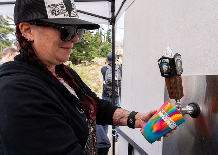 SERVER POURING MT. HOOD BREWING CO. BEER AT TIMBERLINE DAYDREAM